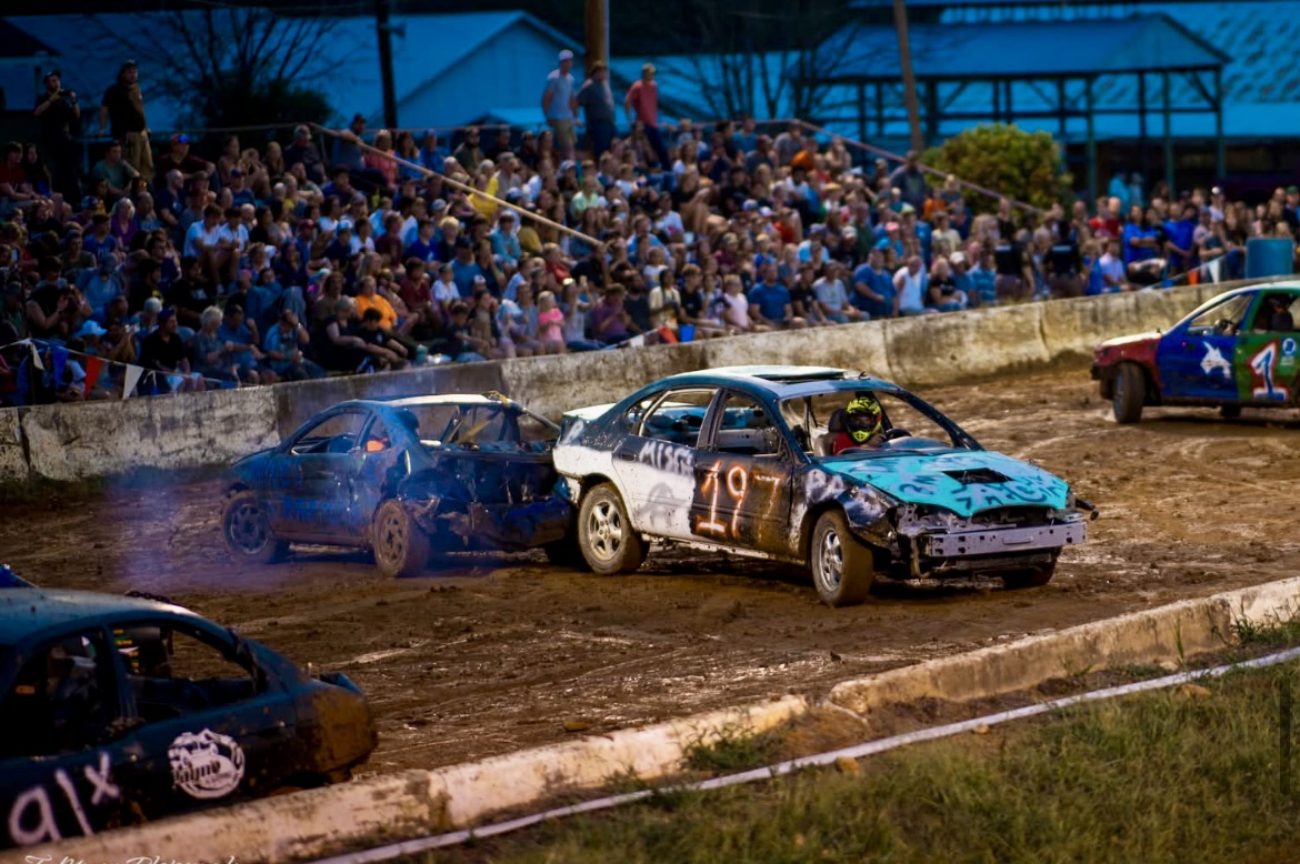 two cars crashing at a demolition derby